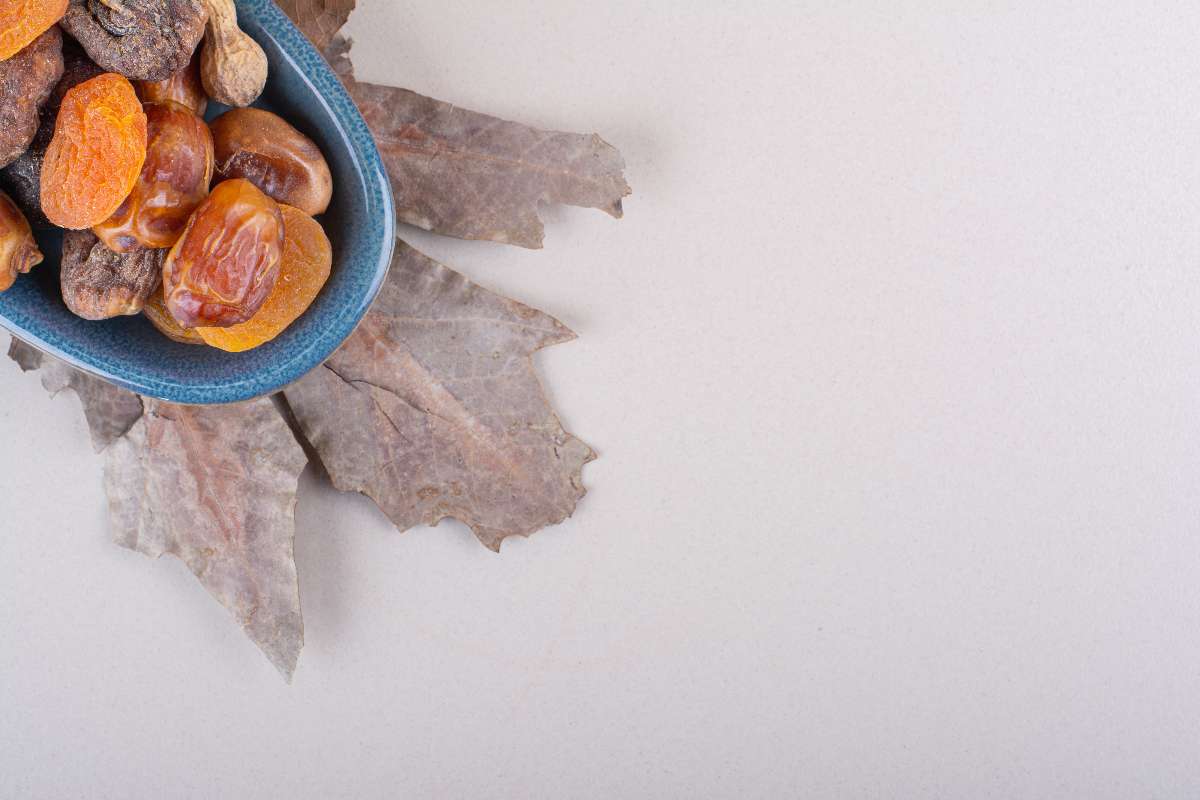 Dried dates on plate for backpain home remedy