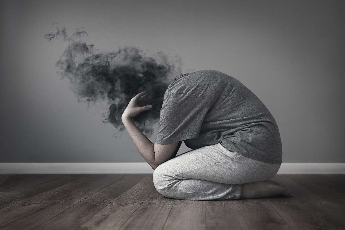 A young boy feeling stressed and depressed.