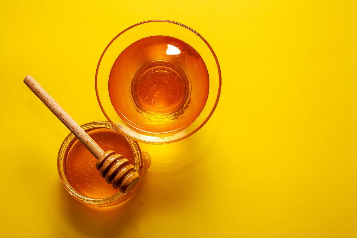 Fresh honey in a bowl to stop coughing at night.